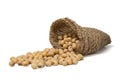 Closeup of fresh dry soybean seed in sack isolated on white background. Clipping path Royalty Free Stock Photo