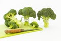 Fresh broccoli with scared cartoon style faces on white background Royalty Free Stock Photo