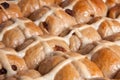 Closeup of fresh hot cross buns baking