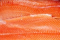 Closeup fresh norwegian salmon fillet fish on professional restaurant kitchen. Textured background. Concept carving fish, cooking Royalty Free Stock Photo