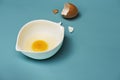 Closeup of fresh organic egg yolk in cup