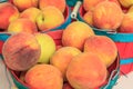 Closeup of Fresh Peaches in Baskets Royalty Free Stock Photo