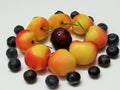 Closeup Of Fresh Red And yellow Rainier Cherries And Blue Berries Royalty Free Stock Photo