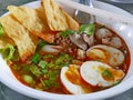 Closeup of fresh spicy noodles soup with tasty broth Guay Tiao Tom Yum Royalty Free Stock Photo