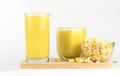 Closeup, fresh sweet corn juice corn milk isolated on white ba Royalty Free Stock Photo