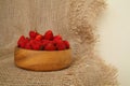 Closeup of fresh strawberries in wooden bowl. Rustic style dessert Royalty Free Stock Photo