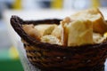 Closeup of fresh white bread for breakfast in brown wicker basket. Macro photo, bread texture Royalty Free Stock Photo