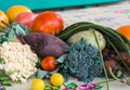 Closeup of freshly harvested vegetables turnips, beetroots, carrots, round marrow, tomatoes, cucumber, zucchini, kidney beans,