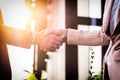 Closeup friendly meeting handshake between business woman and b Royalty Free Stock Photo