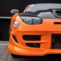 Closeup of front end of a modern sports car Royalty Free Stock Photo
