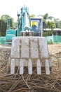 Closeup front loader truck collecting old steel bar from construction site, clearing space Royalty Free Stock Photo