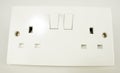 Closeup front view of a double plug socket Royalty Free Stock Photo