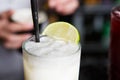 Closeup of frothy coconut pina colada cocktail, party time