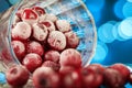 Closeup of the frozen cherry in the glass reflecting on the surface Royalty Free Stock Photo