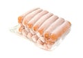 Closeup frozen sausage in plastic bag with ice crystals isolated on white background