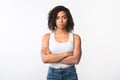 Closeup of frustrated afro girl with crossed arms Royalty Free Stock Photo