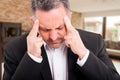 Closeup of frustrated realtor suffering from headache Royalty Free Stock Photo