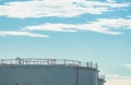 Closeup fuel storage tank in petroleum refinery. White big tank of oil storage. Fuel silo. Liquid petroleum tank. Petroleum oil Royalty Free Stock Photo