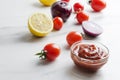 Closeup of full bowl with fresh organic homemade ketchup on white table in the kitchen Royalty Free Stock Photo