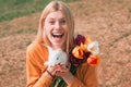 Closeup of funny girl with bunny rabbit. Cheerful and positive girl hold rabbit bunny and celebrating Easter.