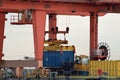 Closeup of Gantry Crane Loading Container onto Truck