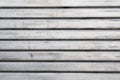 Closeup of garage steel wall texture, horizontal lines pattern, gray vintage striped door, background Royalty Free Stock Photo