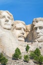 Closeup of George Washington, Thomas Jefferson, and Abraham Lincoln. Presidential sculpture at Mount Rushmore National Monument, S Royalty Free Stock Photo