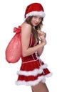 Closeup of girl in santa dress and gifts bag Royalty Free Stock Photo