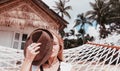 Closeup of glamour young woman in bikini relaxing in a hammock by the beach, tropical paradise holiday Royalty Free Stock Photo