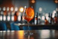 Closeup glass of aperol spritz cocktail decorated with orange at bar background. AI Generation Royalty Free Stock Photo