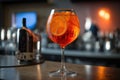 Closeup glass of aperol spritz cocktail decorated with orange at bar background. AI Generation Royalty Free Stock Photo