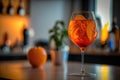 Closeup glass of aperol spritz cocktail decorated with orange at bar background. AI Generation Royalty Free Stock Photo