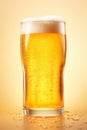 Closeup of glass beer with deep droplets in professional studio Royalty Free Stock Photo