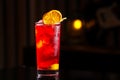 Closeup glass of cocktail with strawberry syrup, rum and lemon d Royalty Free Stock Photo