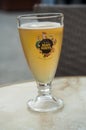 Closeup of glass of french beer from `Mort Subite` brand