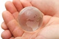 Glass globe in hands Royalty Free Stock Photo