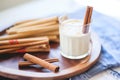 closeup of a glass of horchata with cinnamon sticks Royalty Free Stock Photo