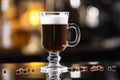 Closeup glass of irish coffee cocktail at bright bar counter Royalty Free Stock Photo