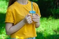 Closeup of glass jar with orange juice in woman`s hand, detox Royalty Free Stock Photo