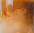 Closeup of glass jug with delicious iced coffee