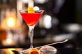 Closeup glass of Manhattan cocktail decorated with orange Royalty Free Stock Photo