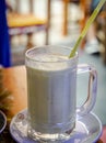 Closeup of a glass of Moroccan avocado milk drink