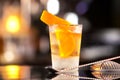 Closeup glass of old fashioned cocktail decorated with orange Royalty Free Stock Photo