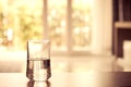 Closeup Glass of water on table in the living room , vintage and retro style Royalty Free Stock Photo