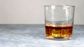 Closeup of a glass of whiskey on a table Royalty Free Stock Photo