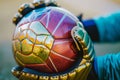 closeup of goalkeeper gloves holding a soccer ball Royalty Free Stock Photo