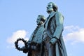 Closeup of Goethe-Schiller-Denkmal monument on blue cloudy sky background in Germany Royalty Free Stock Photo