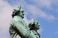 Closeup of Goethe-Schiller-Denkmal monument on blue cloudy sky background in Germany Royalty Free Stock Photo