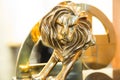 Closeup of gold cannes lion trophy, Shoot at Cannes lions festival 2017, France