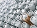 Closeup of gold pile of li-ion batteries. Close up colorful rows of selection of 18650 batteries energy abstract background